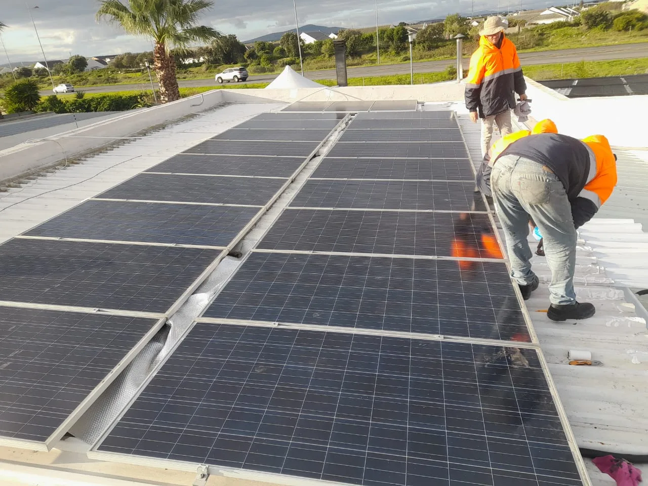 Rooftop solar panel installation completed in Cape Town.